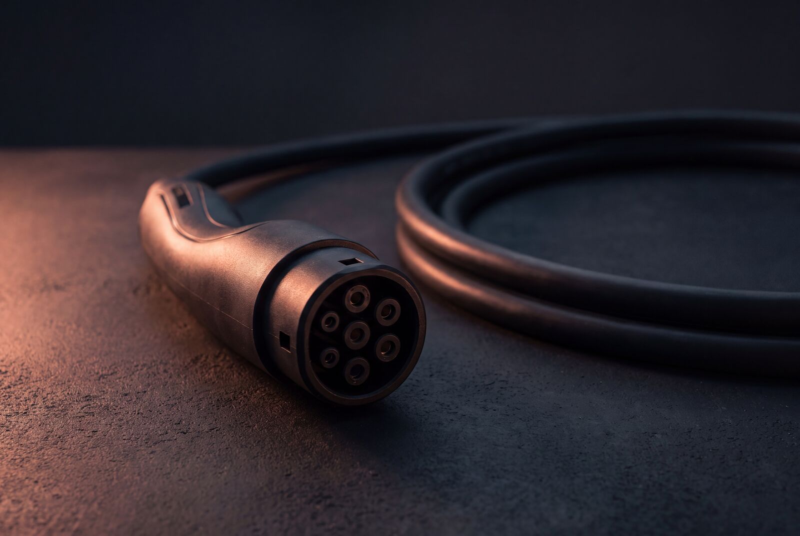 EV charging, product still (brand art, not a job photo)